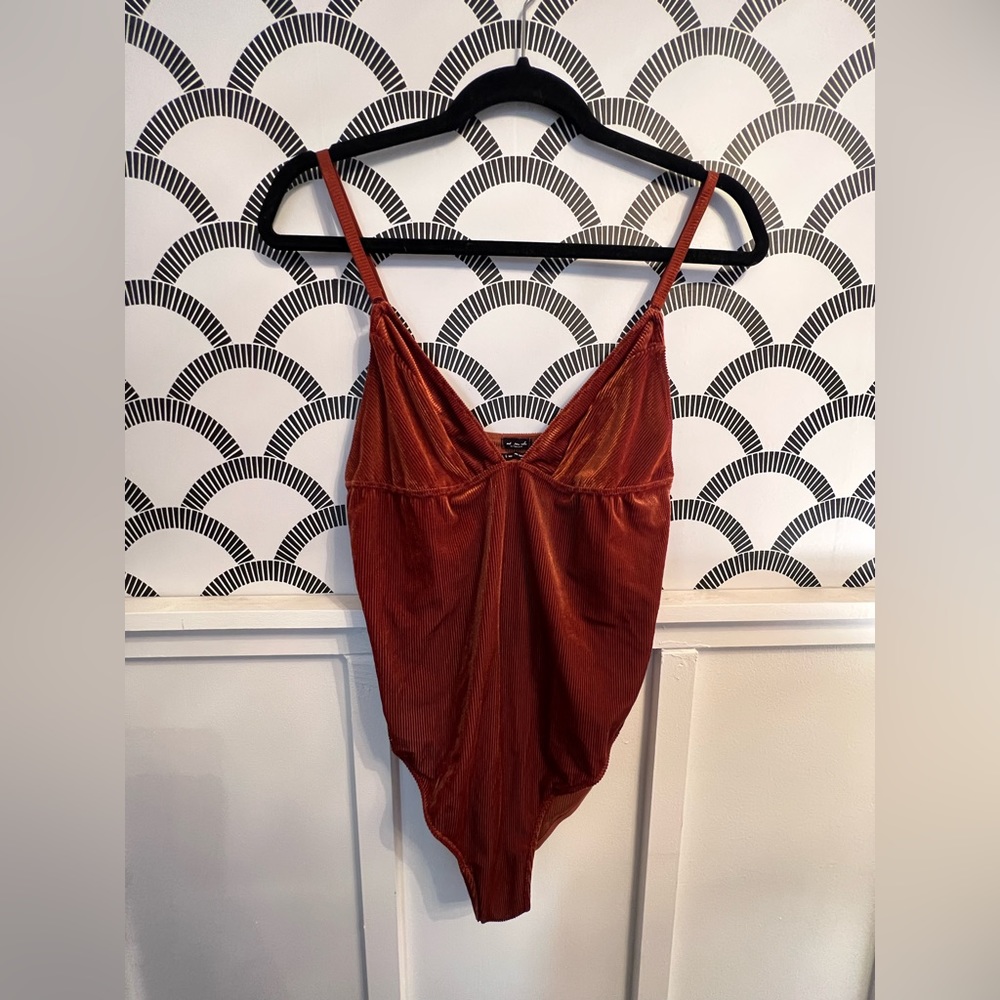 Rust color ribbed bodysuit